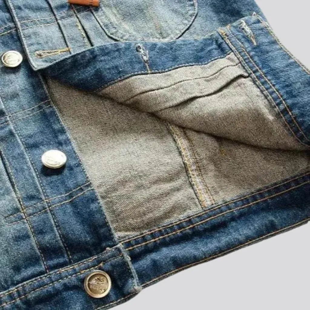 Medium-wash men's denim vest